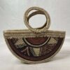 Half moon tote Statement African décor accent ideal for restaurants, lodges, and resort interiors