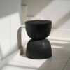 black matt side stool Elegant boho-inspired interior styling piece crafted for contemporary décor setups