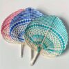 Handwoven bamboo fans Handcrafted African bohemian home décor piece designed to elevate modern interiors