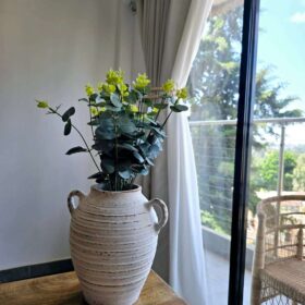 vintage vase flower set Statement African décor accent ideal for restaurants, lodges, and resort interiors