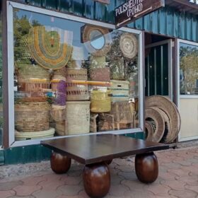 Rich brown finish modern square coffee-centre table Has four sphere legs Dimensions 1x1m Order takes 10days 30k Elegant boho-inspired interior styling piece crafted for contemporary décor setups